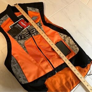 Icon motorcycle interceptor reflective vest. Orange / black / silver.
